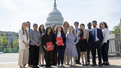 students standing with the US Capitol Dome in the background