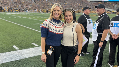 Ellie Riegner on the field in Iowa with Kathryn Tappen