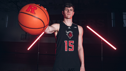 Zach Martini holding a basketball