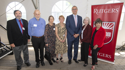 President Jonathan Holloway stands with faculty members 