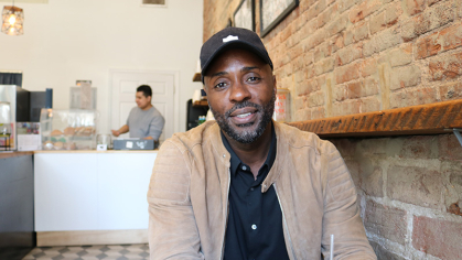Norman Davy is graduating from Rutgers-Newark with a degree in psychology.