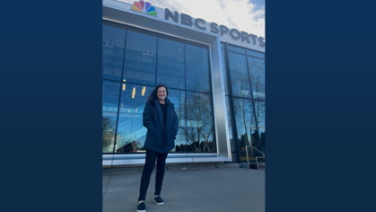 Lauren Boone standing in front of NBC Sports building 