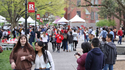 Students, faculty, alumni and community members walking around Voorhees Mall during Rutgers Day 2024.
