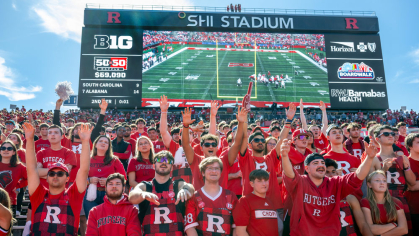 Rutgers students cheer at a football game at SHI Stadium