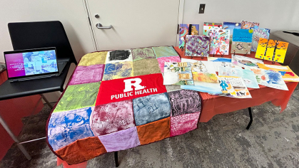 Rutgers school of public health table with art and wellness resources