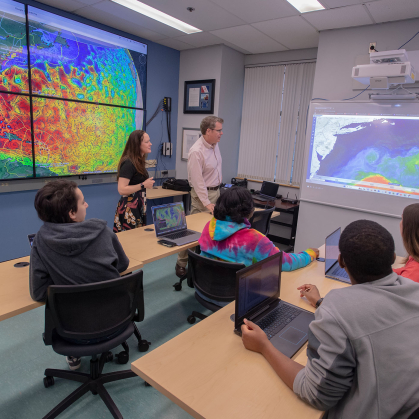 Rutgers Center for Ocean Observing Leadership students sitting during class