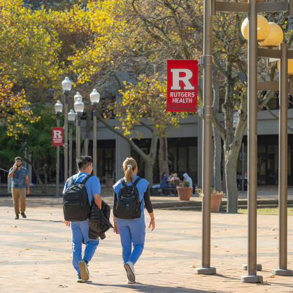 Rutgers Health students walking on campus