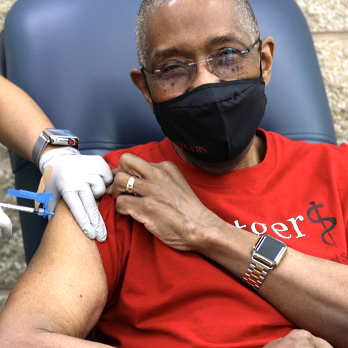 Dean Robert Johnson receiving COVID vaccine
