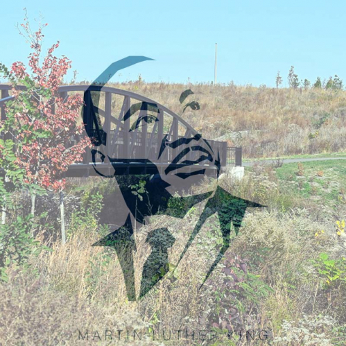 Image of Martin Luther King Jr superimposed over an image of Cramer Hill Waterfront Park in Camden