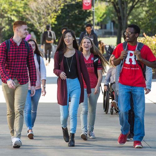 Rutgers students on campus walking