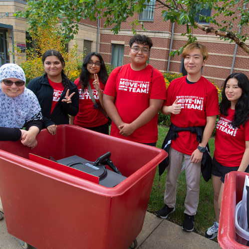 Rutgers students help new students move in to their dorms
