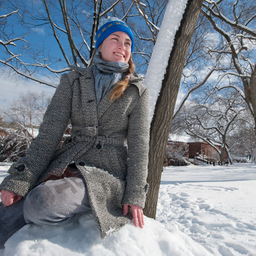 Rutgers student enjoys the snow on Voorhees Mall