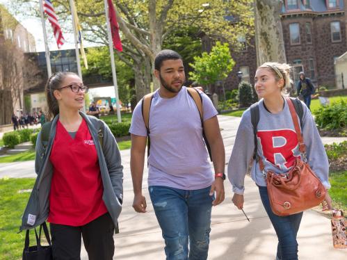 Students walkimg on campus