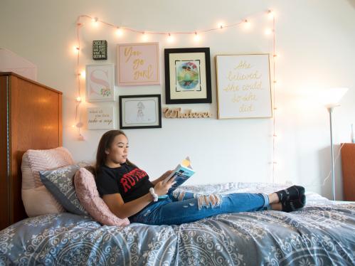 Student in a dorm room