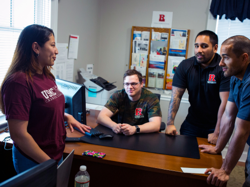 Kimberly Delgado (SAS '20), Daniel Cherdak (SAS '20), Carlos Baldwin (RBS '21), and Roger Licairac SGS) talk in the Veterans House