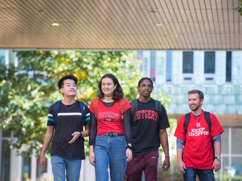 Max Morency (RBS ’22), Sarah Connely (RBS ’23), Michael Chyr (RBS ’23), and Damian Nikezi (RBS ’22) walk on Livingston Campus