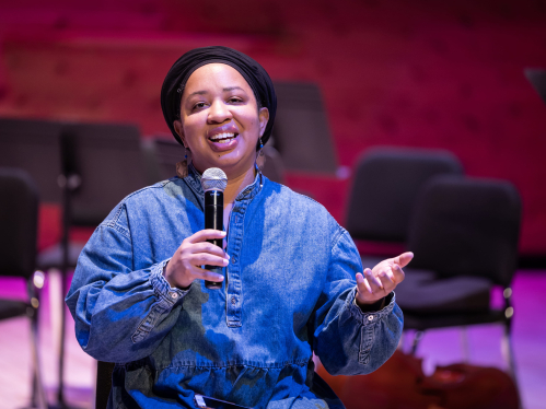 Courtney Bryan speaking at a seminar