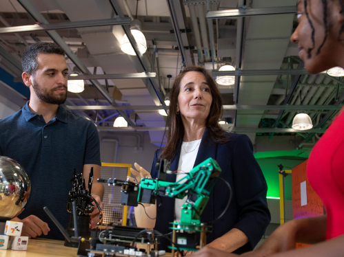 lectrical and Computer Engineering Professor Kristin Dana (c.) on set with SOE graduate students