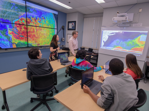 Rutgers Center for Ocean Observing Leadership students sitting during class