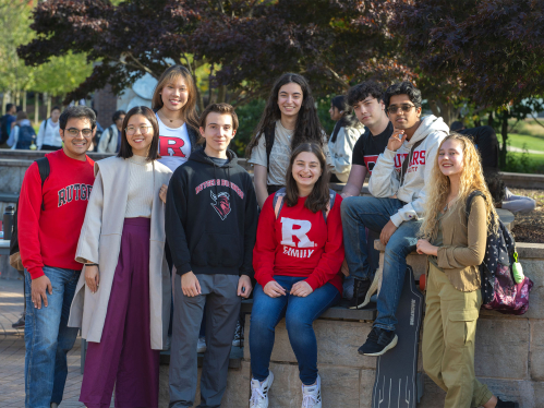 Rutgers students hanging out and chatting outside of Livingston Student Center