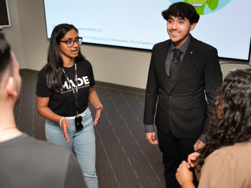 Rutgers business school student speaking with a job recruiter