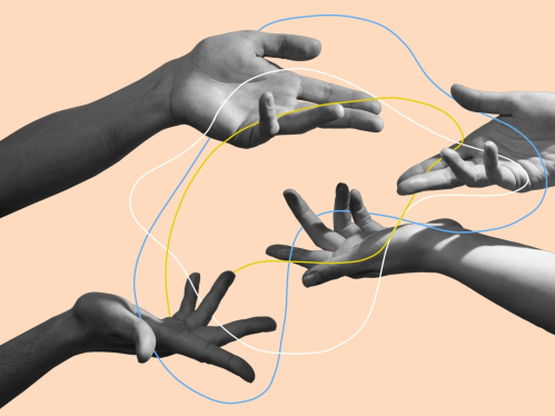 photograph of intertwining hands