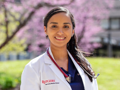 Medical Student Angelica Lopez stands in the courtyard outside Rutgers New Jersey Medical School. 