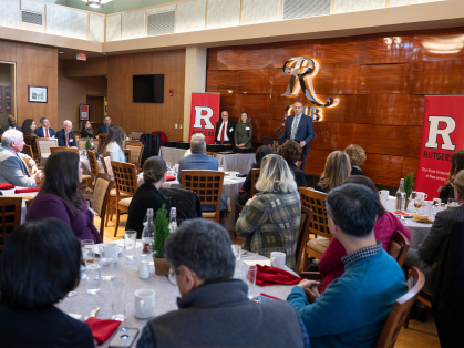 President Holloway speaking at the podium at the Presidential Employee Excellence Recognition Program 