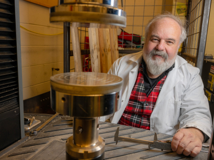 THomas Nosker, who was indcuted into the National Academy of Inventors in 2024, works in his lab.
