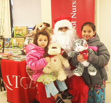 Santa with kids and their teddy bears