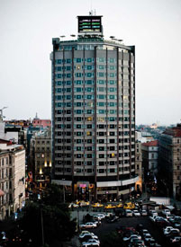 'Evacuate Istanbul,!' Akin's installation on an Istanbul hotel roof uses data from a Turkish earthquake observatory center to announce tremors being recorded in towns throughout the country.