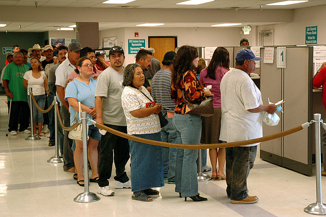 Unemployed workers signing up for benefits