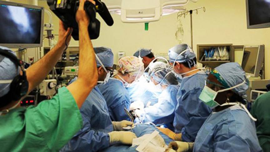 Image of ABC News camera recording in operating room