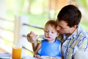 Fathers can help to make sure their child has enough to eat.