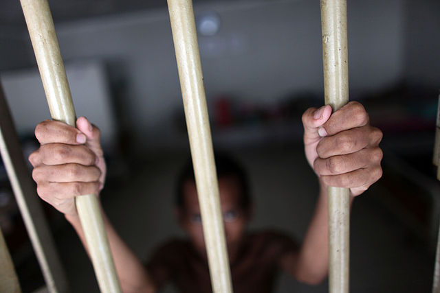 prisoner in cell
