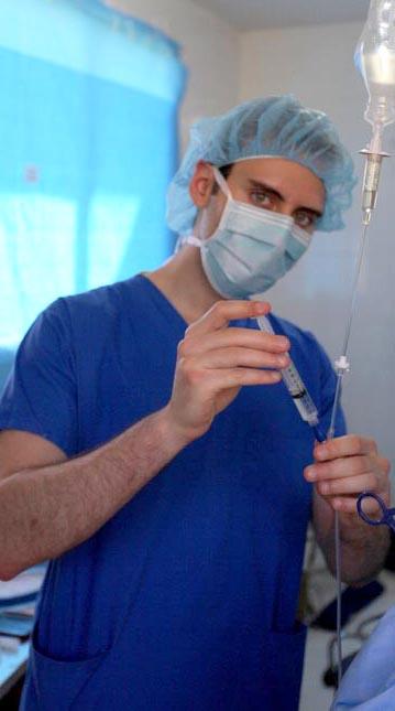 Image of Chris Ojeda working as an anesthesiologist's assistant
