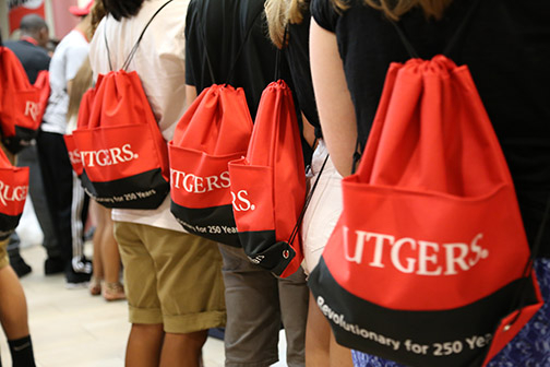 Images of Rutgers students with back packs