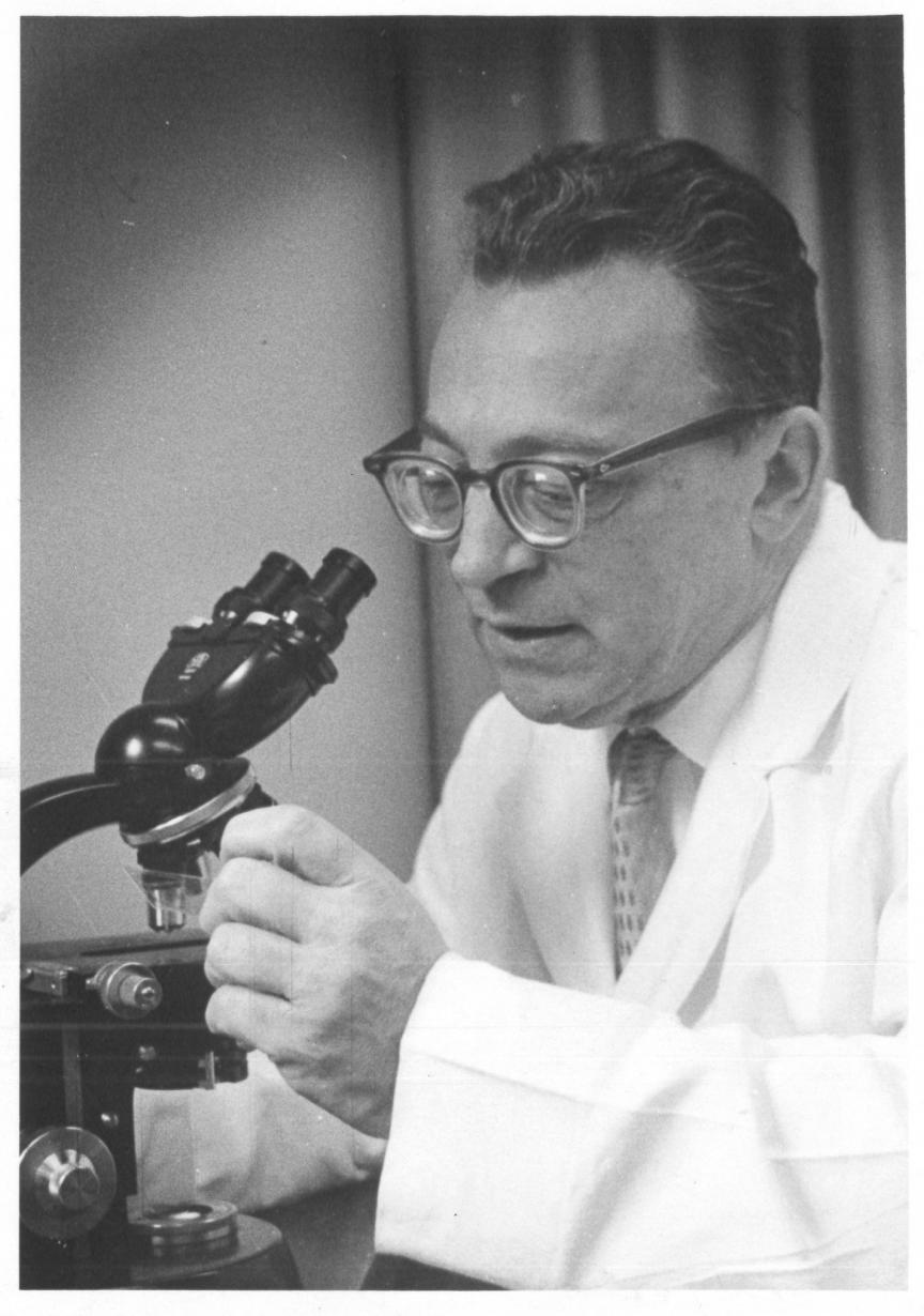 Auerbach at microscope
