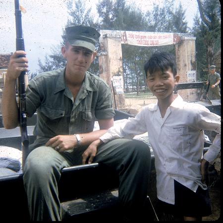Ray Taylor with Vietnamese man
