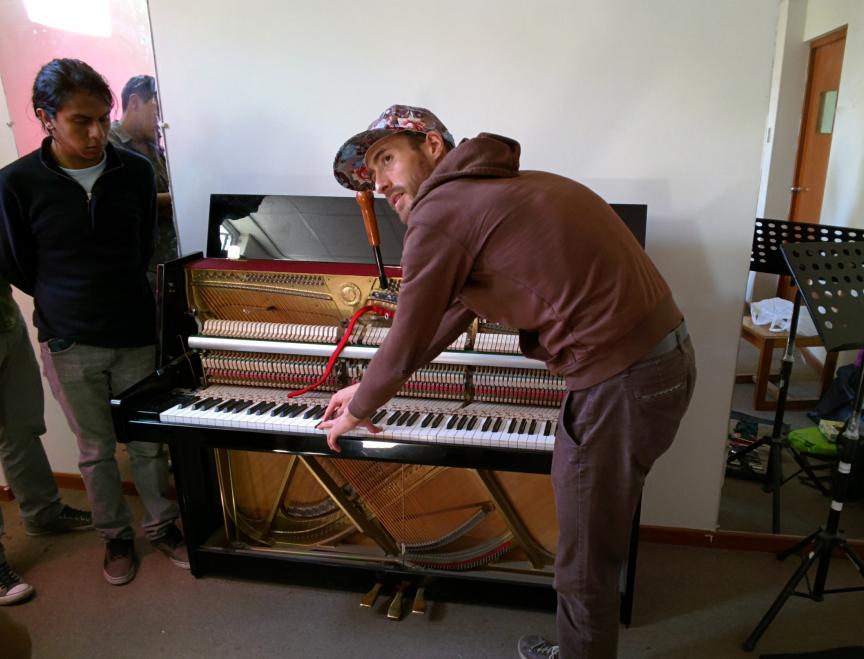 Eathan Janney tuning a piano