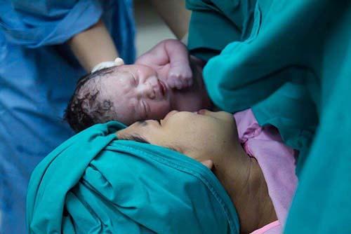 Image of mom with her infant just after giving birth