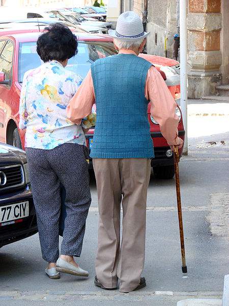 Elderly couple walking