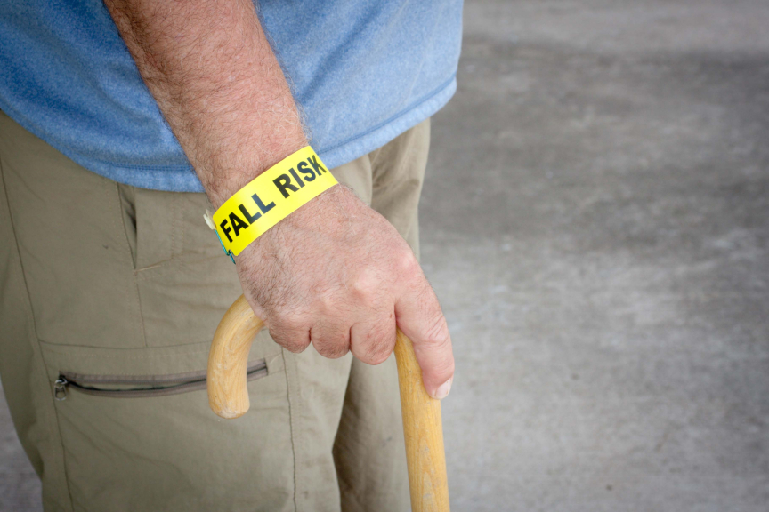 Image of male senior citizen using a walker