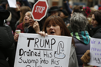 Women marching against Trump