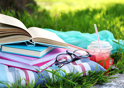 open book and reading glasses