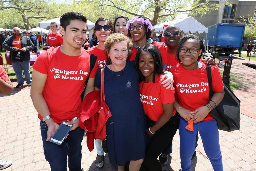 Newark chancellor Nancy Cantor and students pose for a photo on the first Rutgers Day on the Newark campus