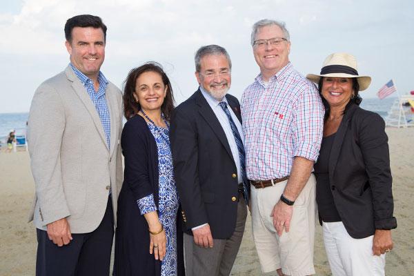 Rutgers Today, Rutgers News - Monmouth Medical Center Welcomes Rutgers Robert Wood Johnson Medical School Students, Rutgers and RWJ Barnabas leadership, including Chancellor Brian Strom, pose for a photo on a New Jersey beach
