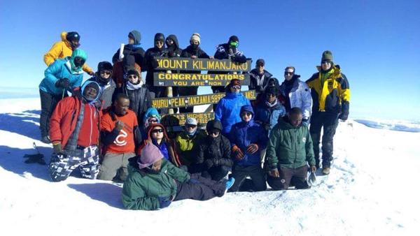 Choose a Challenge group atop Mount Kilimanjaro