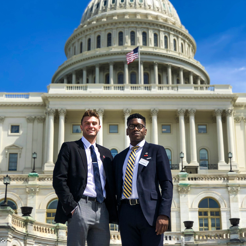 Luke Hinrichs and Samuel Adepoju