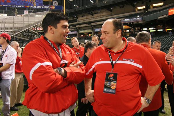 James Gandolfini on the field during the 2005 Insight Bowl with Marco Battaglia, a former Rutgers All-American tight end and current assistant athletic director for development.